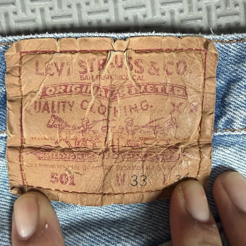 Vintage Levis 501 90s Jeans 33x34 Fits 32x33 Light Wash Made in USA Button Fly